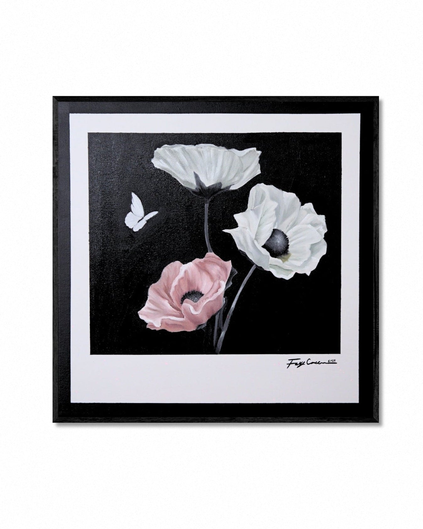 Framed artwork of pink and white flowers with a butterfly on a black background